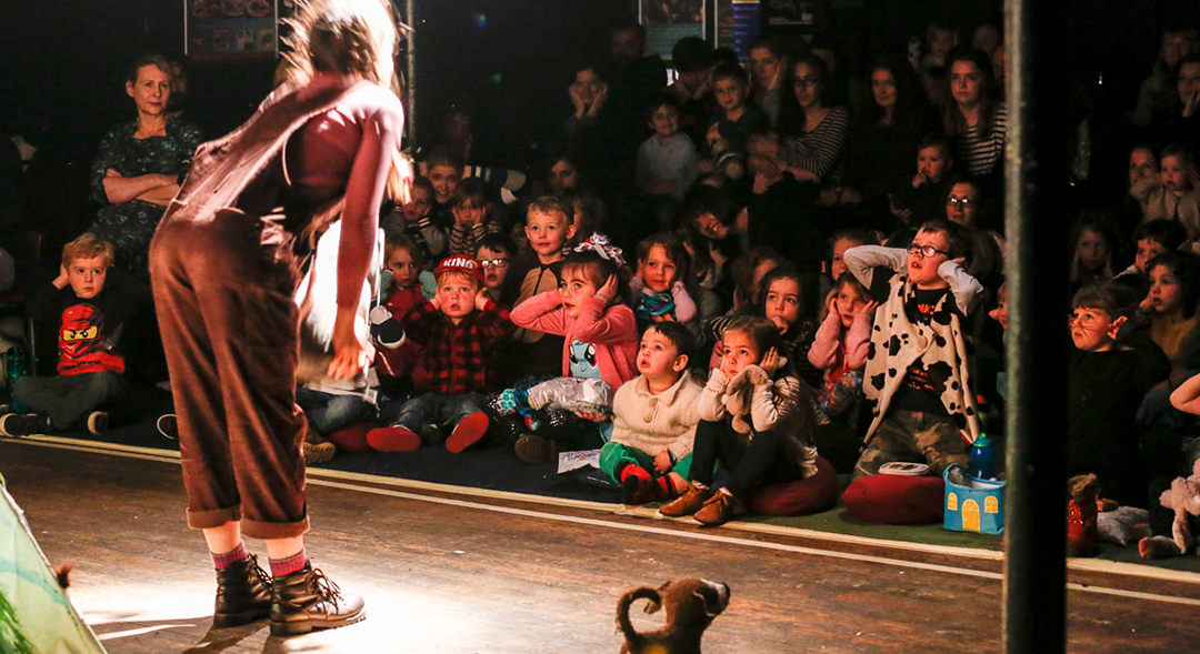 Natasha performing in front of an audience at a showing of Oskar's Amazing Adventure. Photo Paul Mansfield